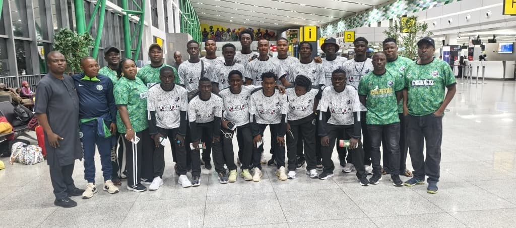 Players and staff together on departure day.